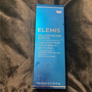 ELEMIS Invigorating Body Oil in Blue Packaging